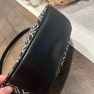 NWT. Michael Kors Dover large half moon handbag.